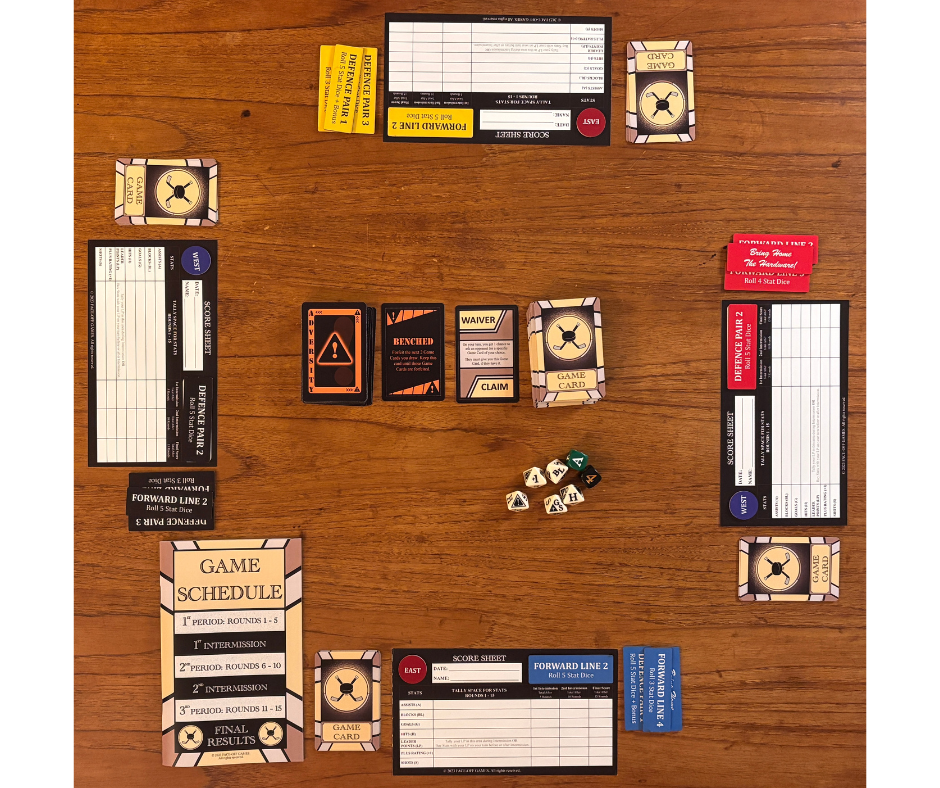 Hockey Hardware components that are set-up and ready to play on a wooden table surface.